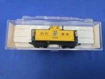 N-scale Caboose Chicago And North Western. N276. Fixed Price $14.00.