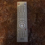 Akai 00265A Tv Dvd Vcr Combo Remote Control CXN2085TP B27TF6. Fixed Price $15.00.