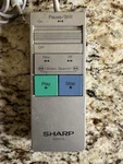 Sharp Wired Vcr Remote Control K0027G Silver Untested Long Cord Vintage. Fixed Price $20.00.