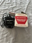New Old Stock Radio Shack Realistic Adapter 65-702 120 Vac Vdc. Fixed Price $17.00.