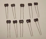 Ten (10) Cde 560PF Nos Cornell Silver Mica Radial Capacitors 300V 5-PERCENT. Fixed Price $6.50.